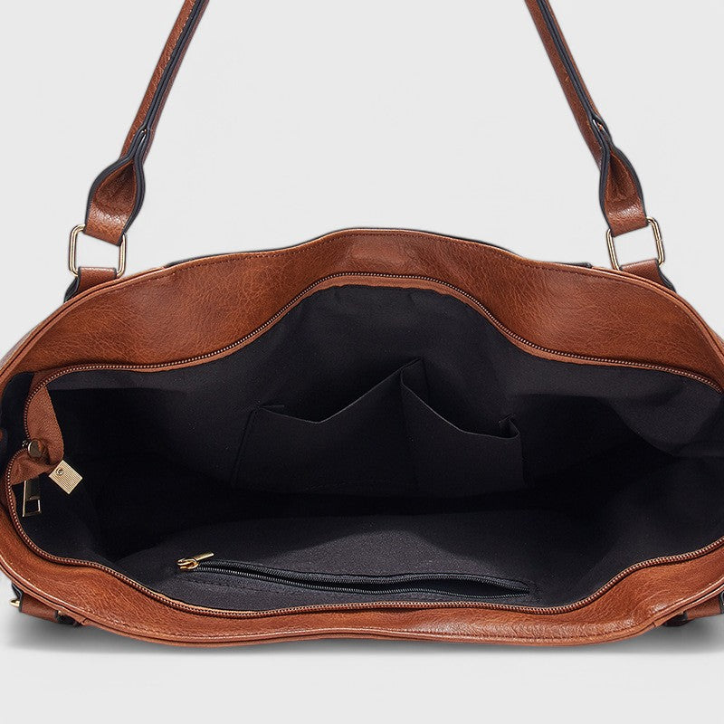 Aurora™ | Borsa Elegante con Frangia