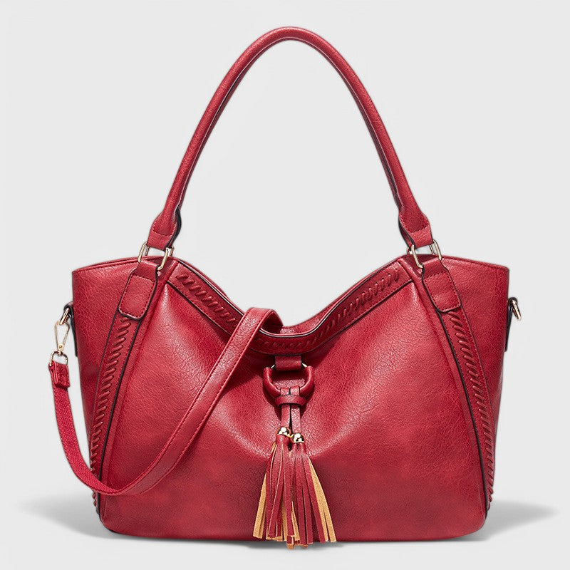 Aurora™ | Borsa Elegante con Frangia