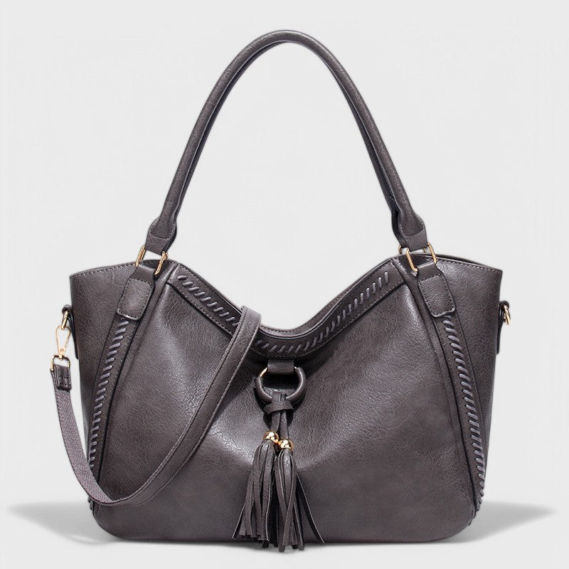 Aurora™ | Borsa Elegante con Frangia